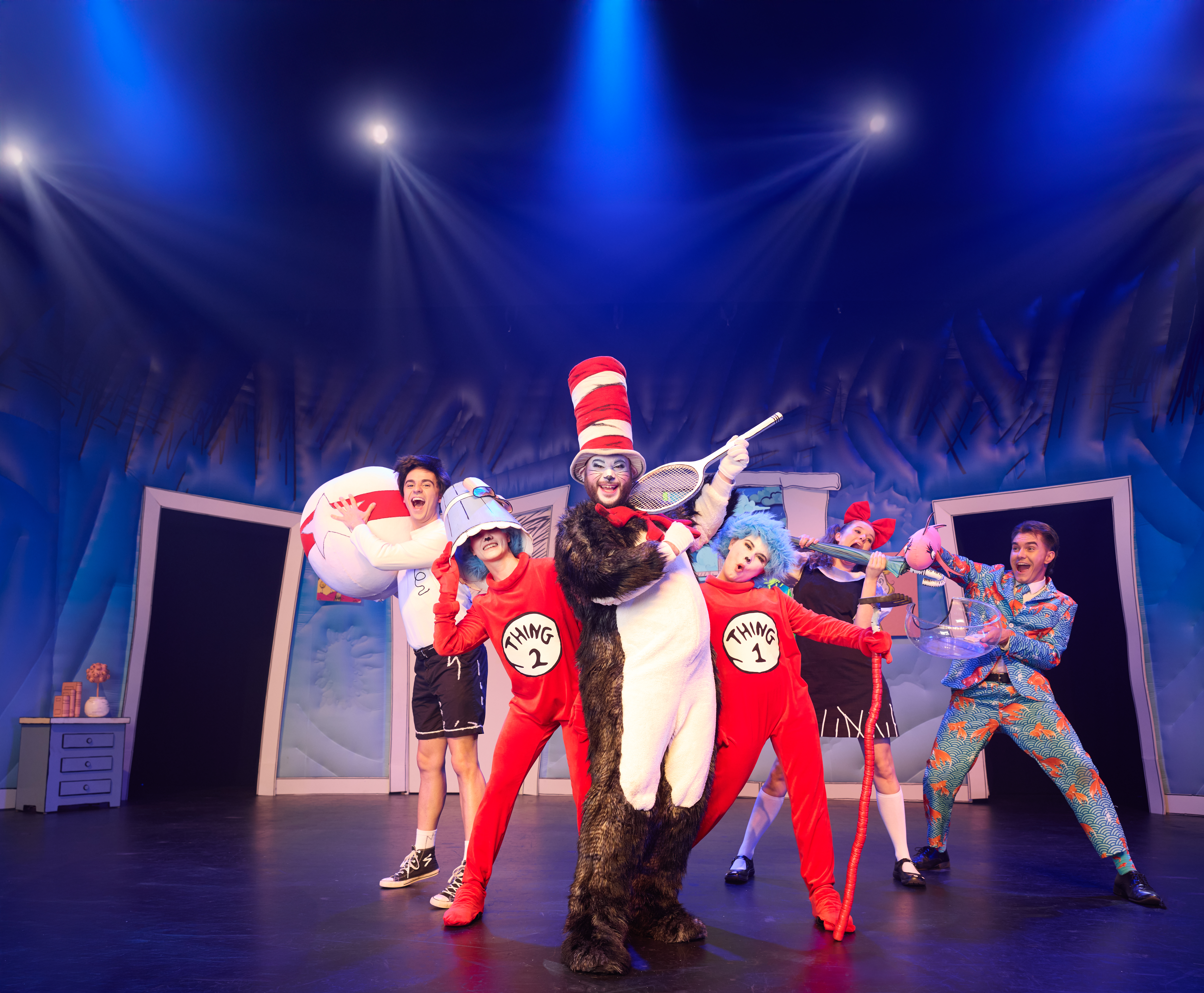 actors on stage portraying cat in the hat