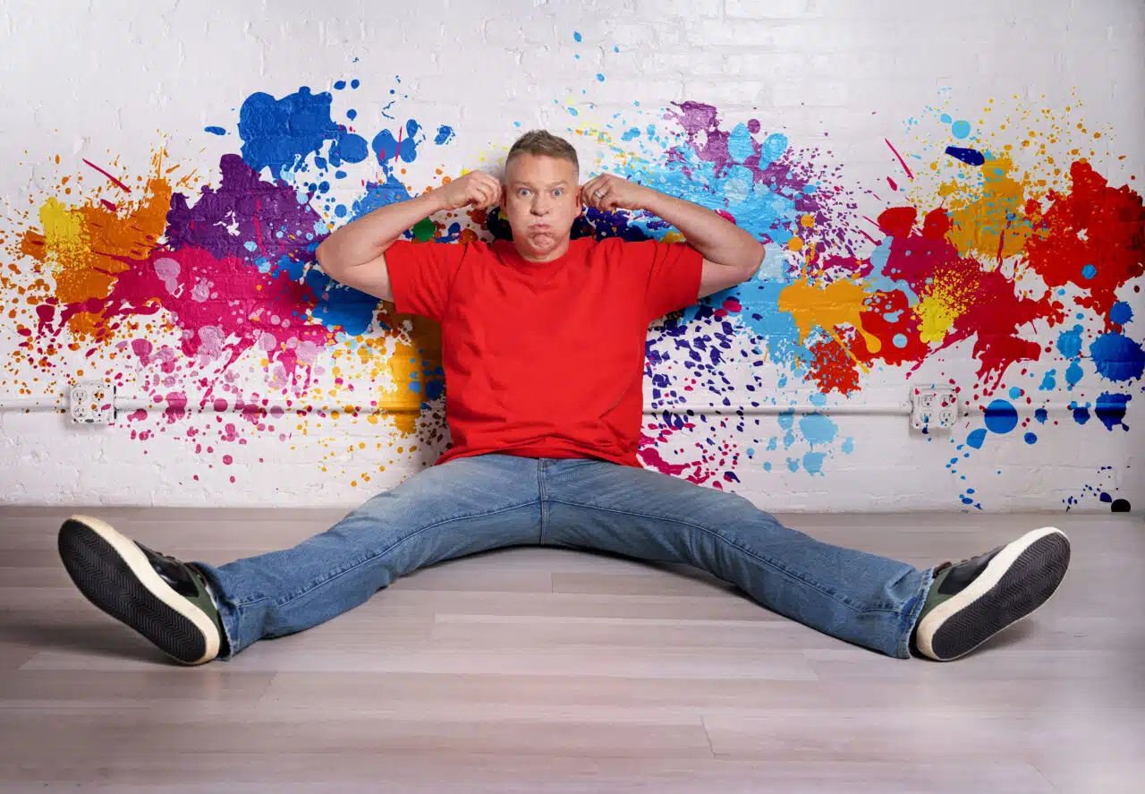 photo of comedian Gary Owen on a paint splatter background