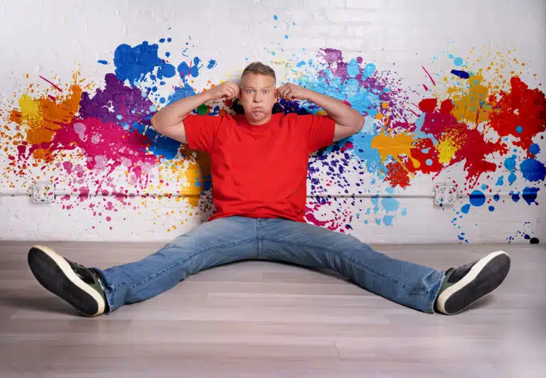 photo of comedian Gary Owen on a paint splatter background
