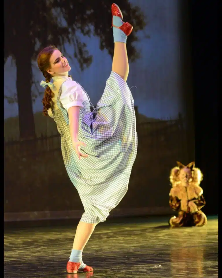 dancer portraying Dorothy from The Wizard of Oz along with logo for Owensboro Dance Theatre