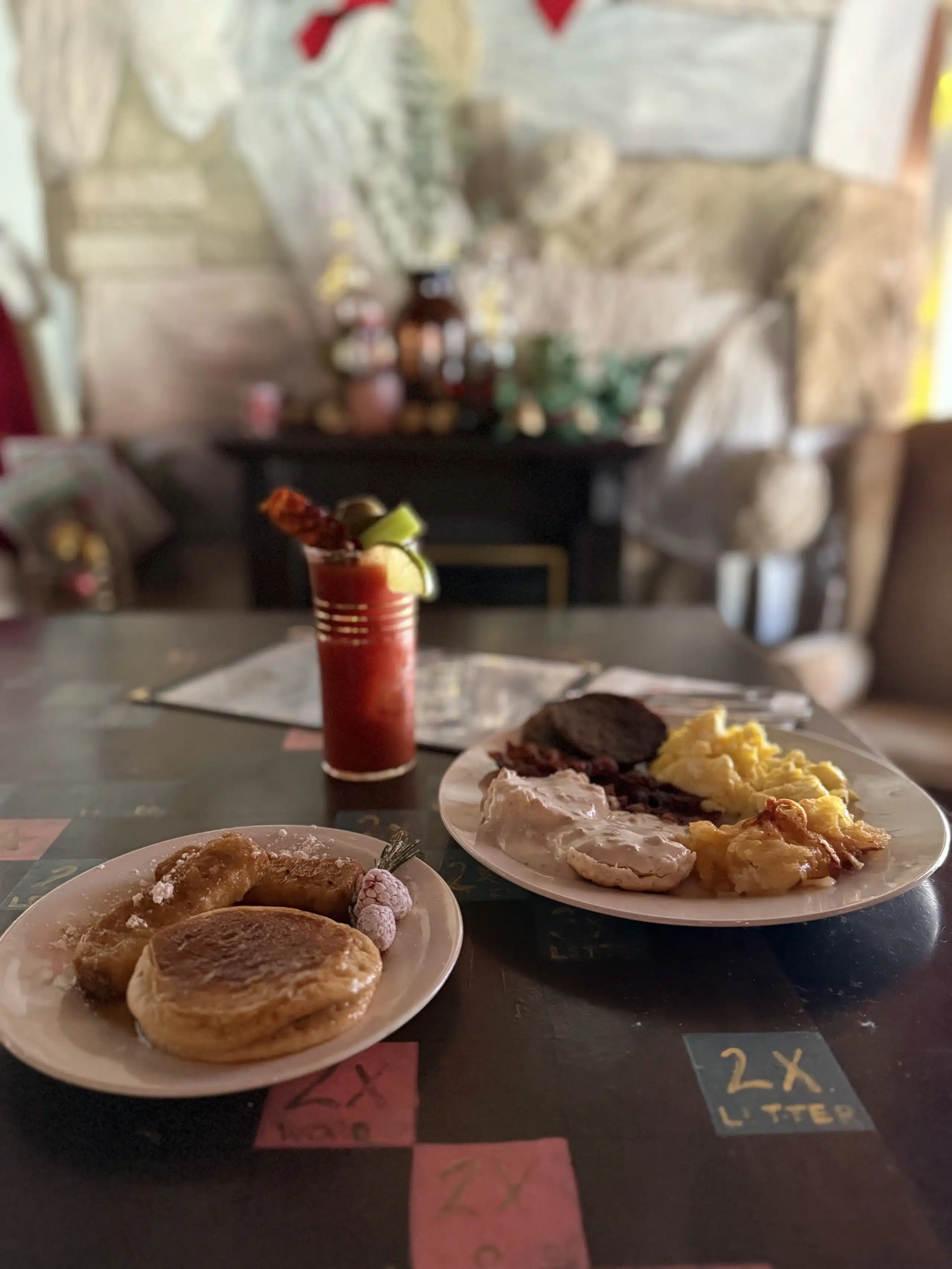 photo of brunch plates and bloody mary