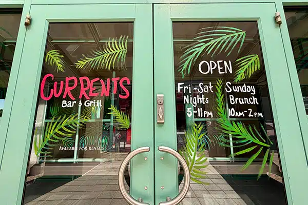 exterior photo of entrance to tropical themed pop up bar