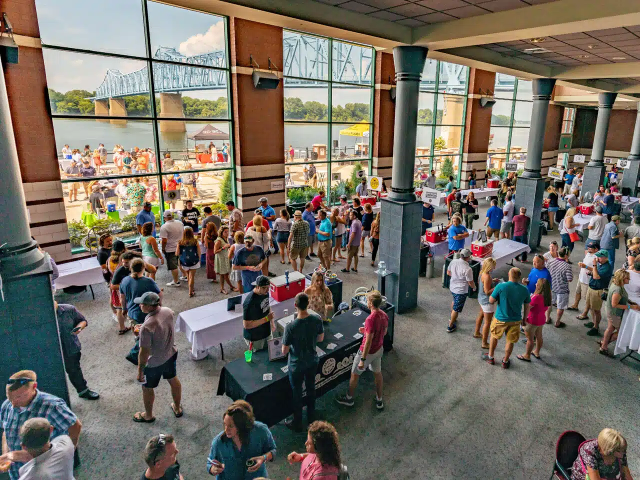 A crowd enjoys an event in the RiverPark Center Lobby