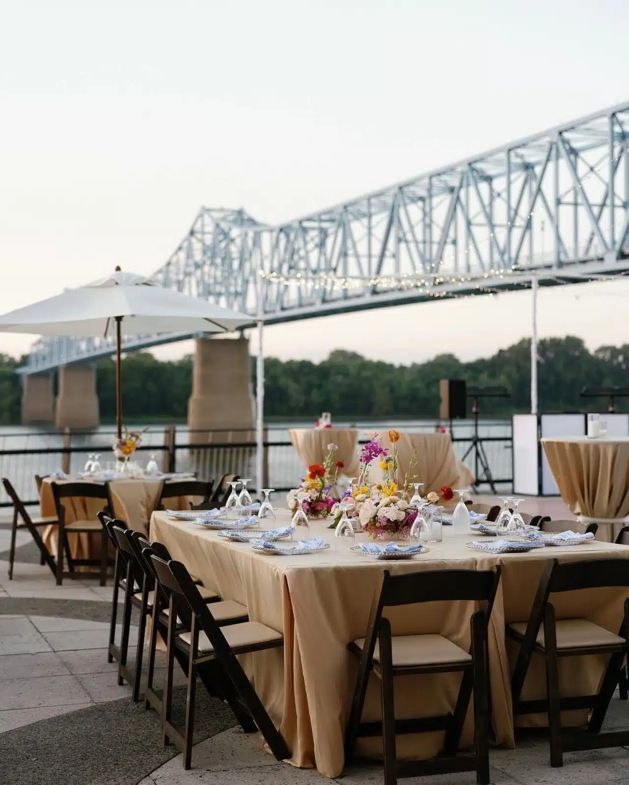 Tables are set for a wedding reception on the RiverPark Center Plaza.