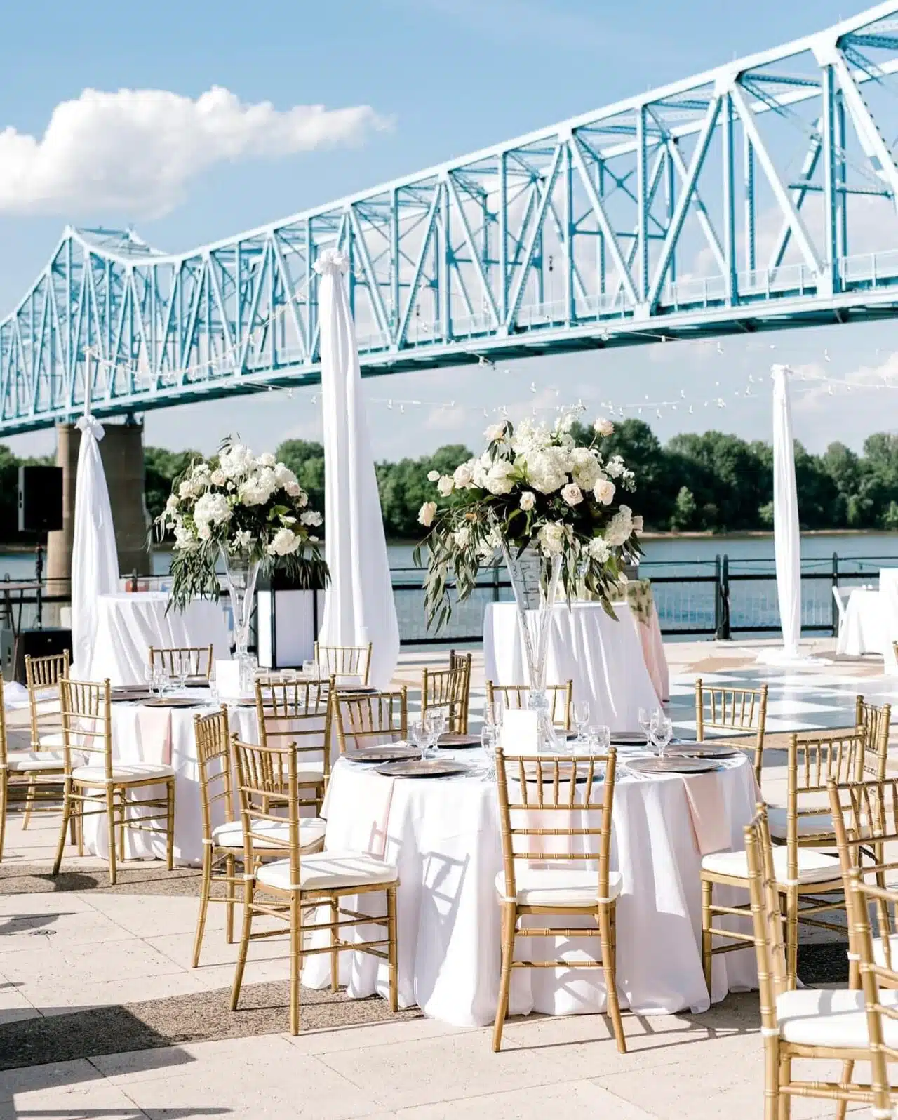 Tables are set for a wedding reception on the RiverPark Center Plaza.