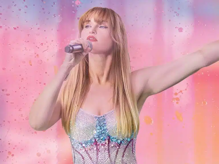 performer singing taylor swift songs
